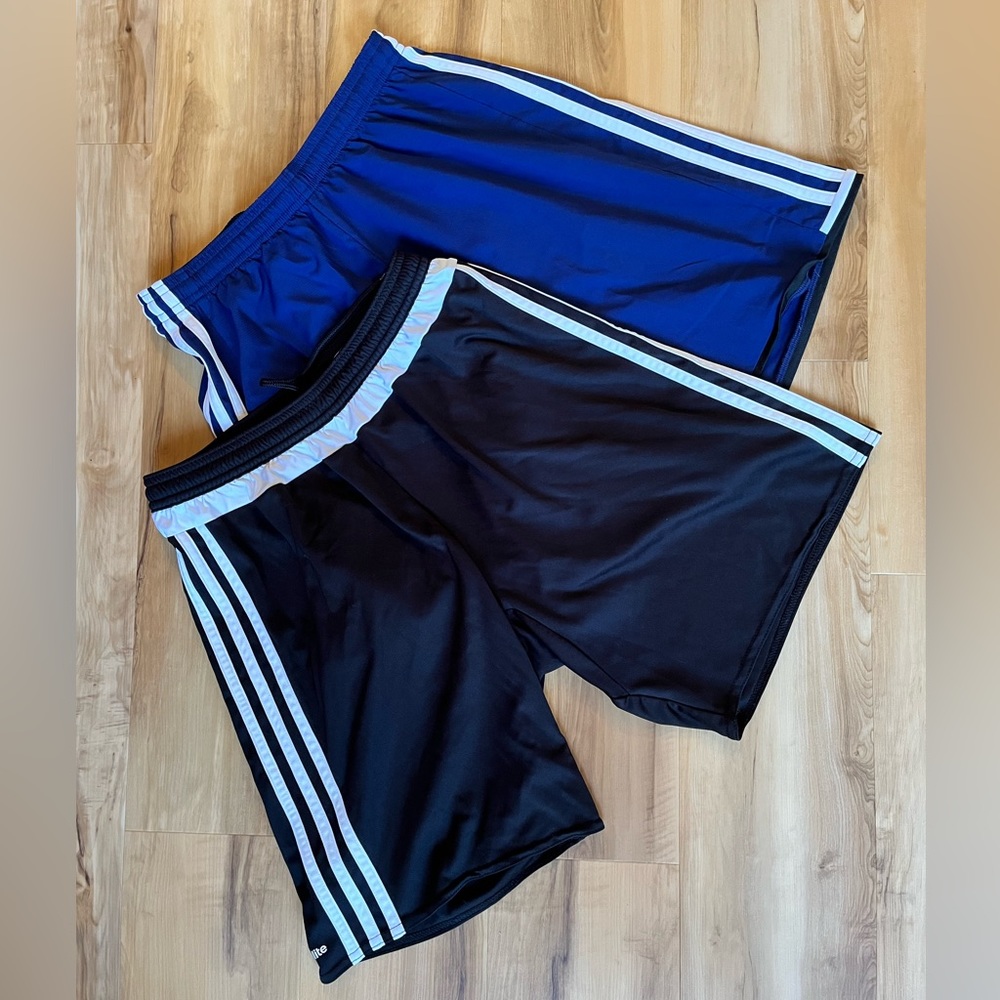 Set of 2 Adidas men’s size small athletic shorts.